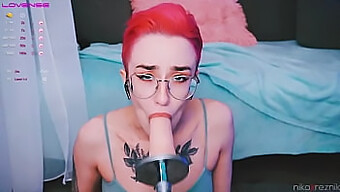 Young Woman With Masculine Traits Receives Oral Sex From A Mechanical Sex Toy